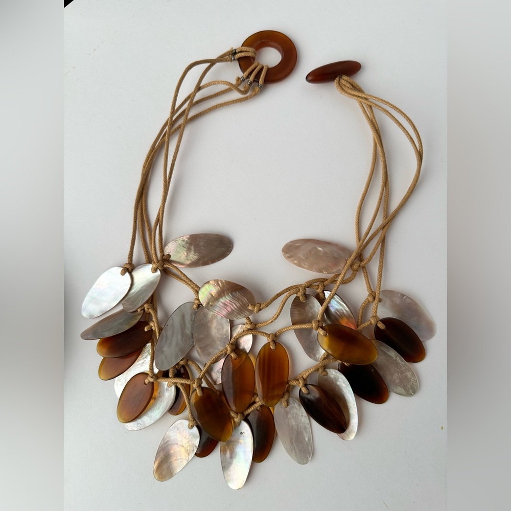 This is a bib necklace‎ featuring iridescent abalone B1
